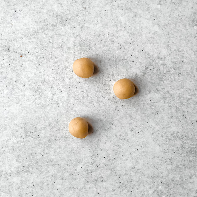 Rolled marzipan balls before shaping into eggs