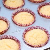 Baked lemon cupcakes cooling before frosting