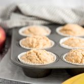 Banana apple muffins in a muffin pan