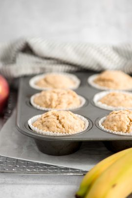 Banana apple muffins in a muffin pan
