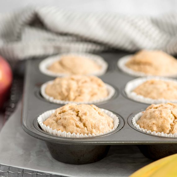 Banana apple muffins in a muffin pan