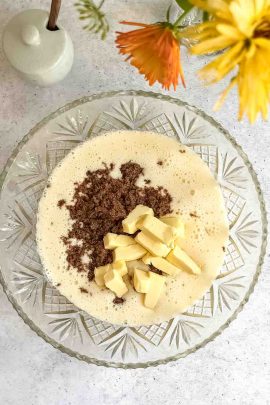 Banana cake batter being mixed in a bowl