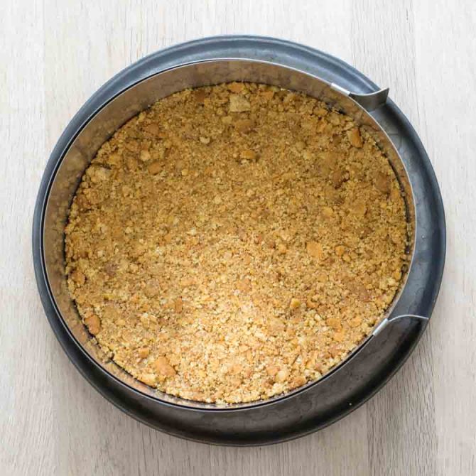 Biscuit crust pressed into a cake pan