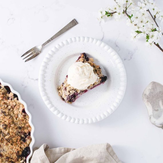 Baked blueberry crumble in a dish