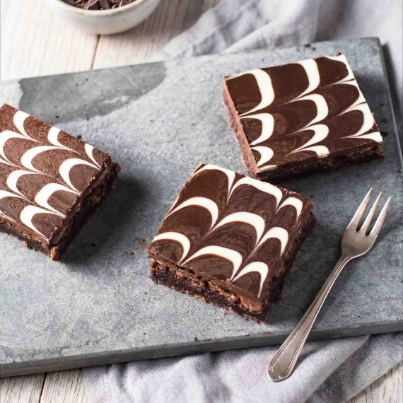Brownie topped with chocolate frosting and pattern design