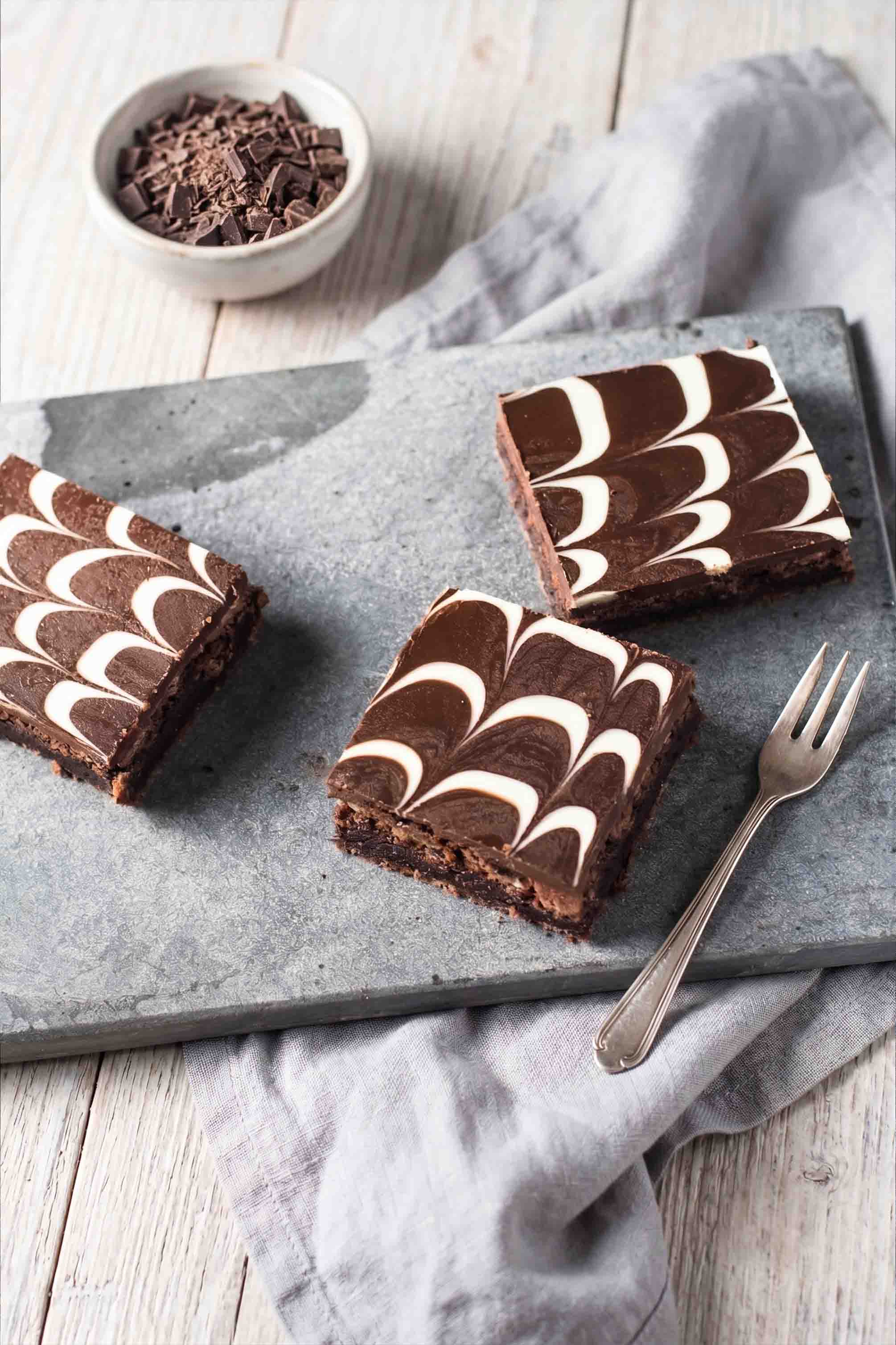 Brownie topped with chocolate frosting and pattern design