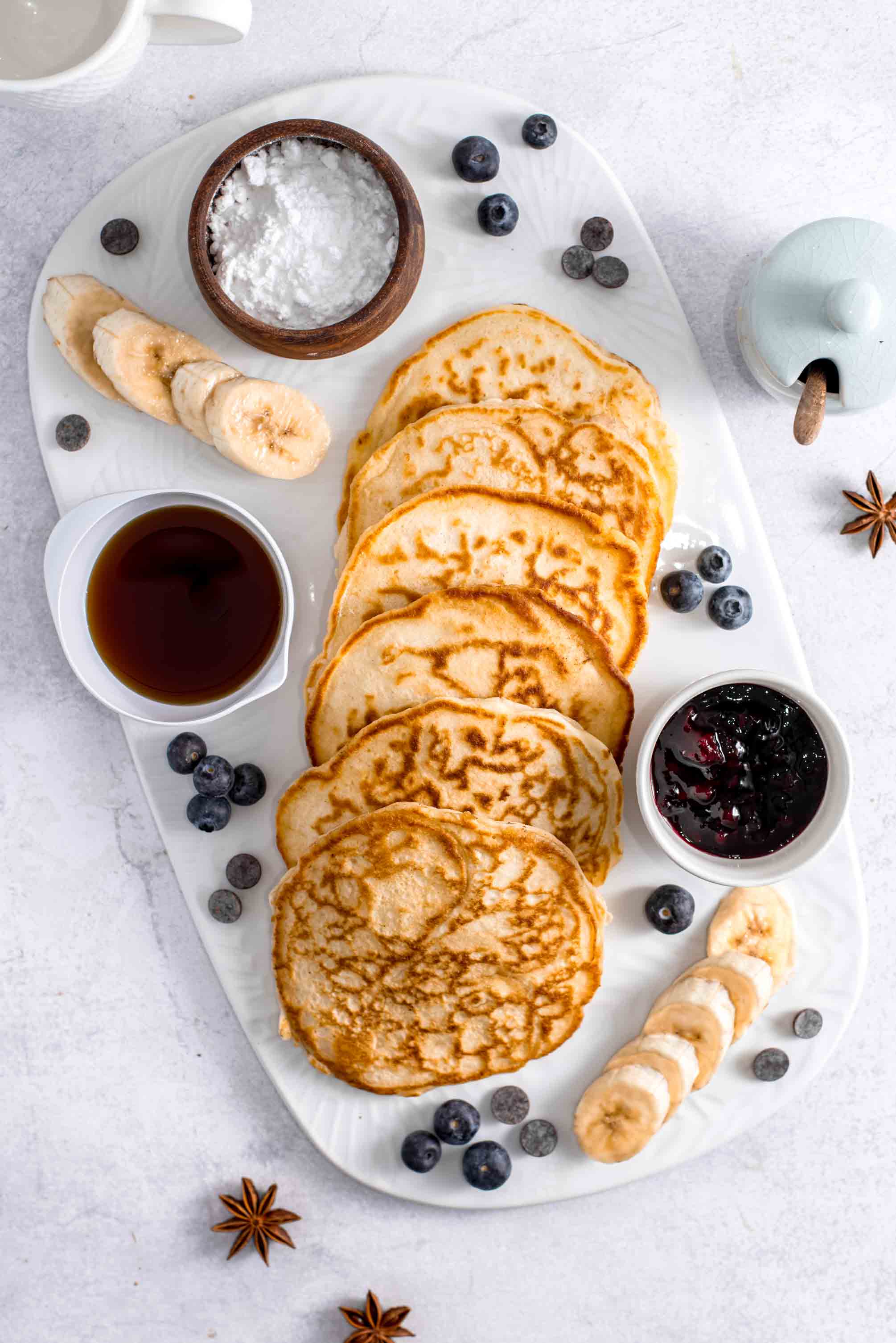 Fluffy pancakes stacked on a plate for brunch