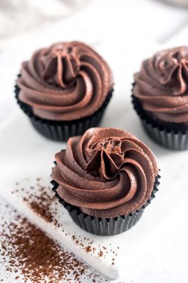 Bowl of chocolate cocoa buttercream frosting