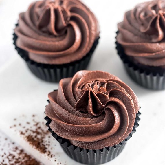 Bowl of chocolate cocoa buttercream frosting