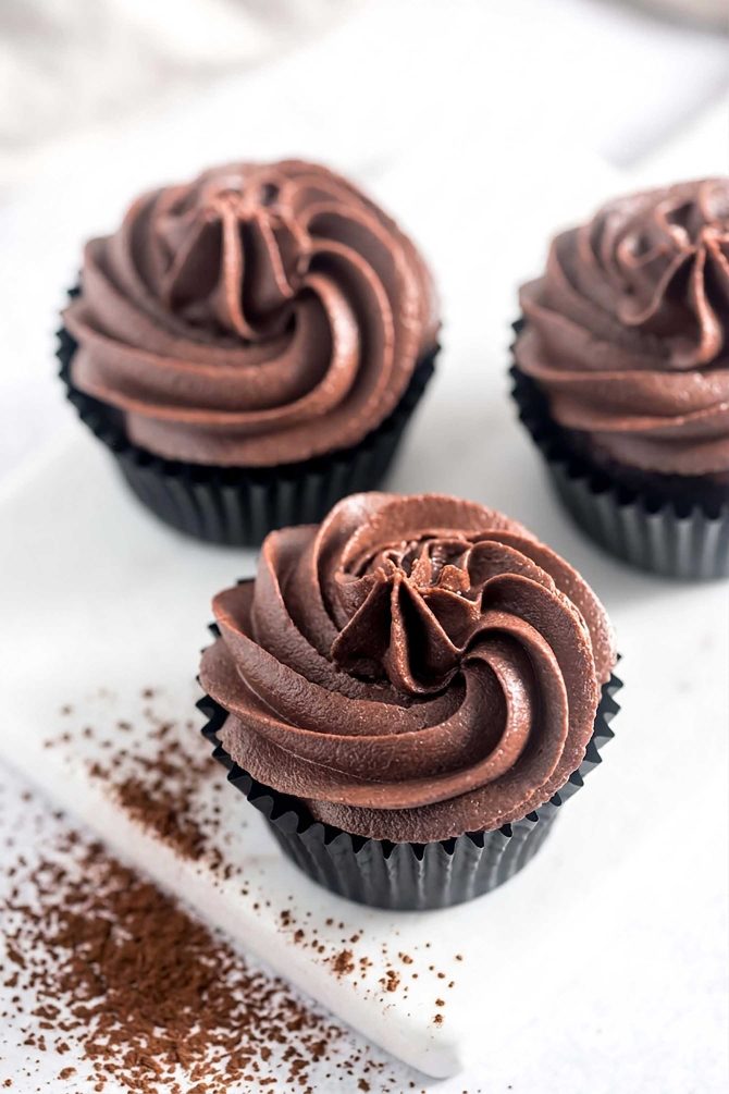 Bowl of chocolate cocoa buttercream frosting
