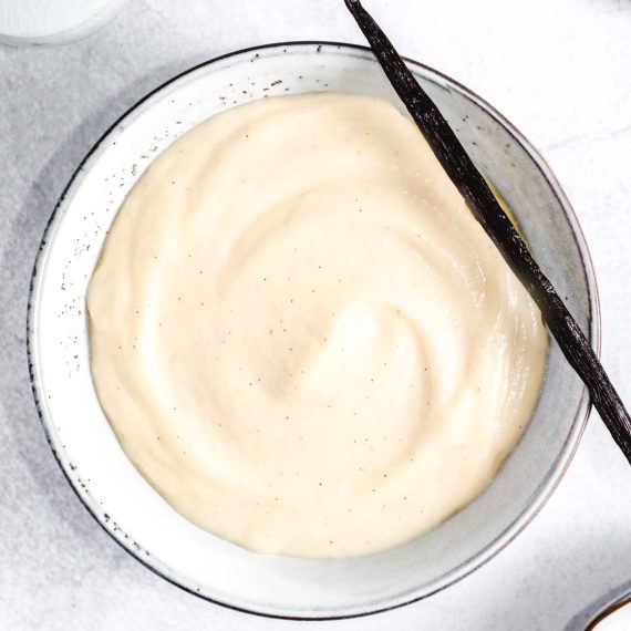 Bowl of vanilla pastry cream, smooth and pale yellow