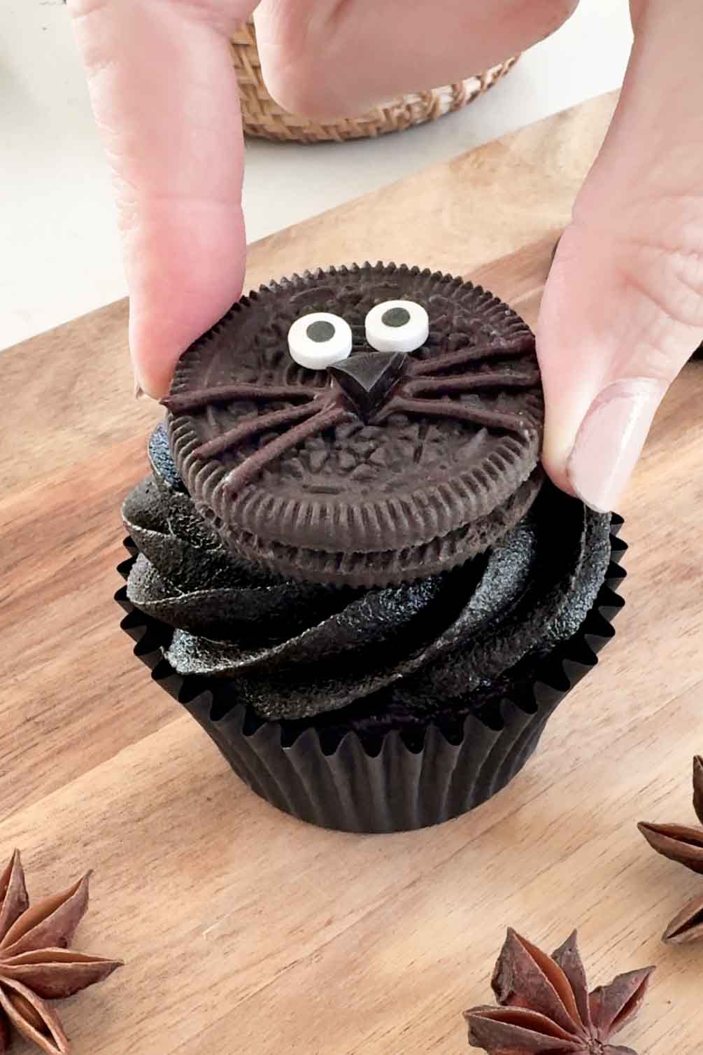 Black cat cupcakes decorated for Halloween