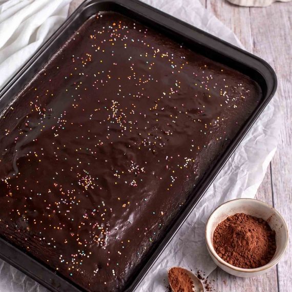Chocolate sheet cake with chocolate frosting and sprinkles