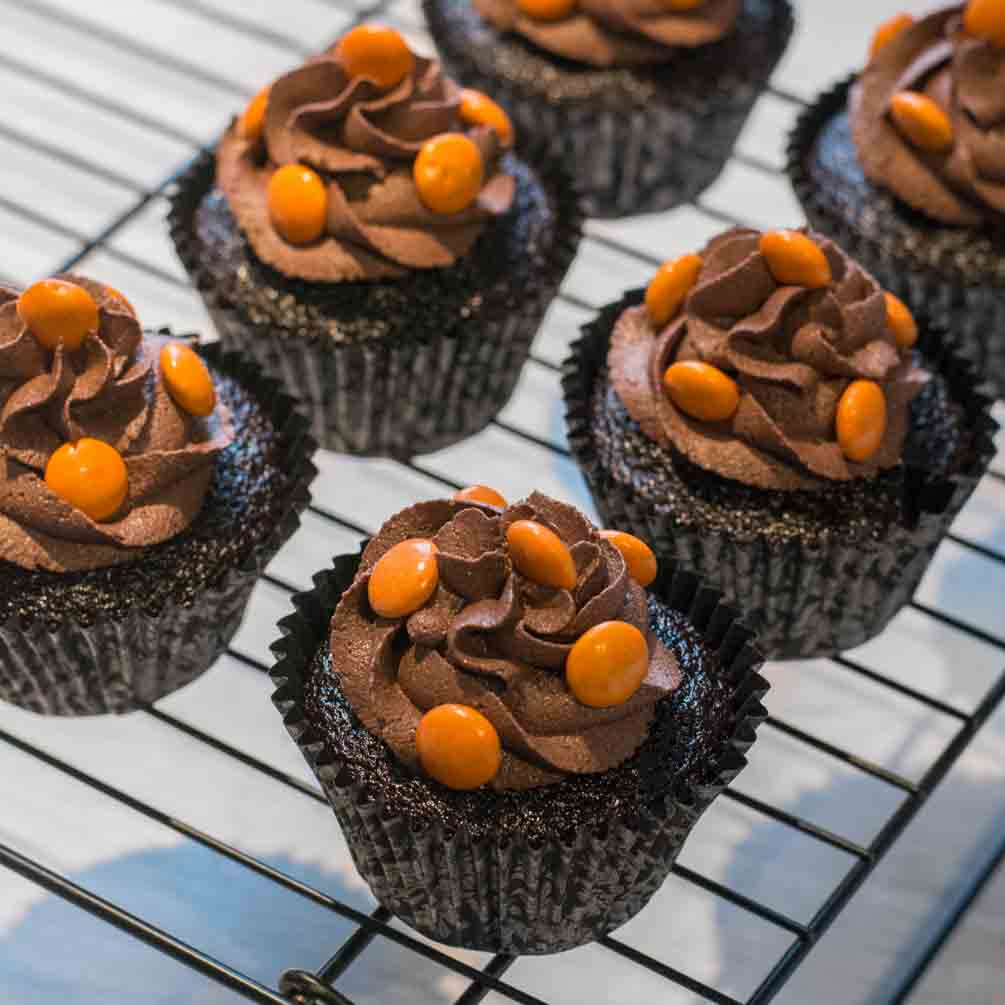 Chocolate cupcake topped with M&M's candies