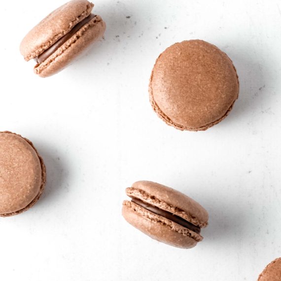 Chocolate macarons filled with dark chocolate ganache
