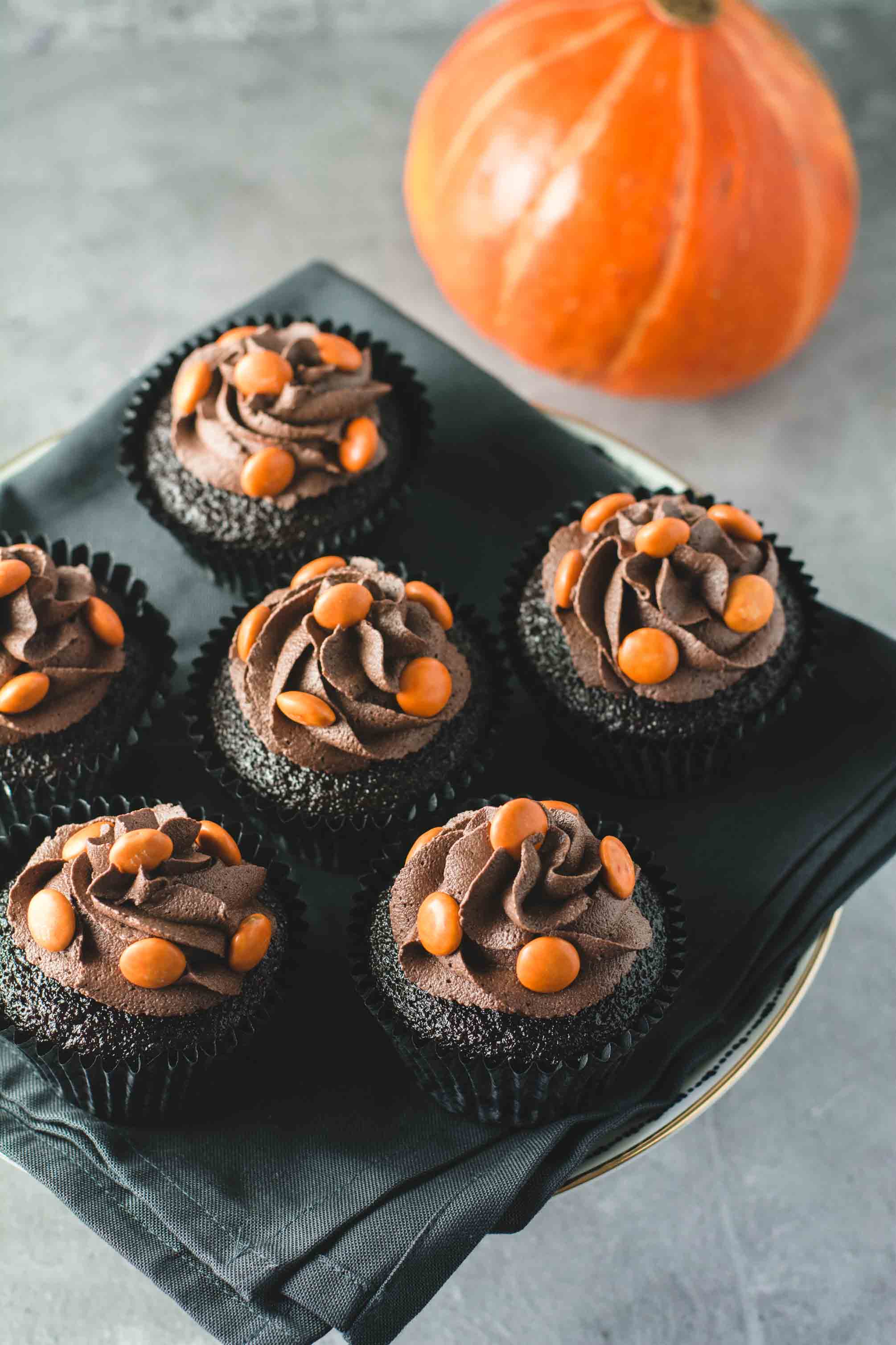 Chocolate Halloween cupcakes with frosted tops