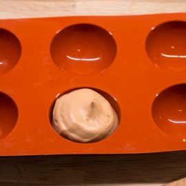 Chocolate mousse layer spread in a baking pan