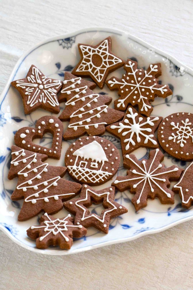 Batch of chocolate sugar cookies shaped for Christmas