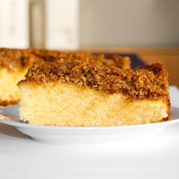 Slice of Danish coconut dream cake on a plate