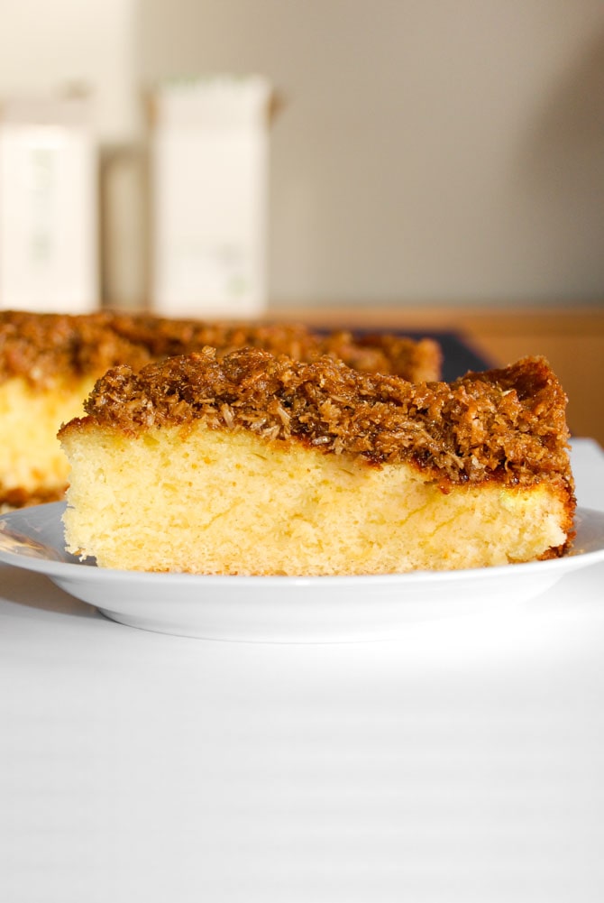 Slice of Danish coconut dream cake on a plate
