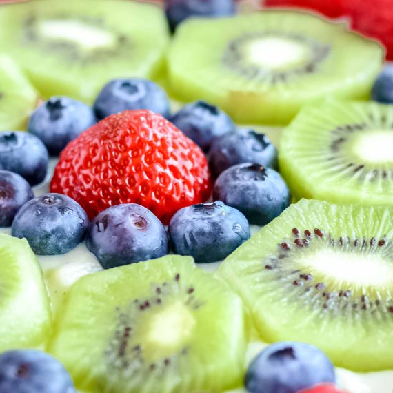 Fresh fruit custard tart with sliced fruit on top