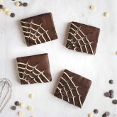 Halloween chocolate brownies with spider web swirl on top