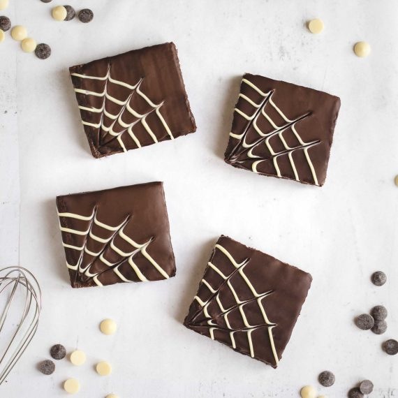 Halloween chocolate brownies with spider web swirl on top