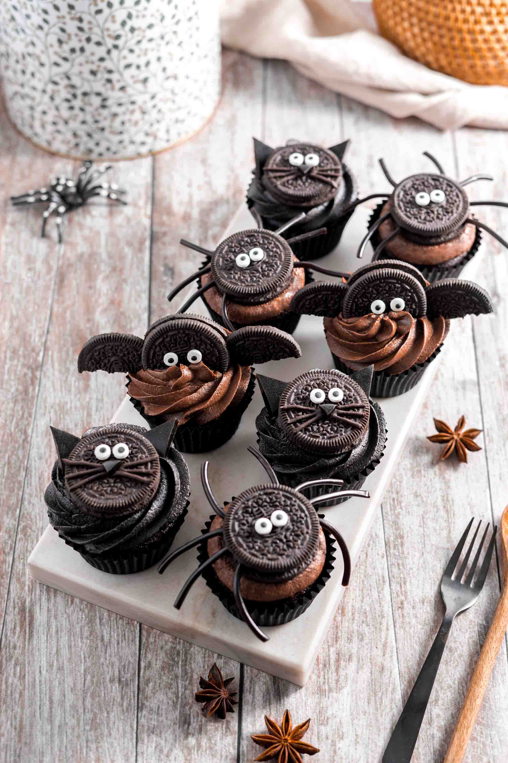 Halloween cupcakes decorated like black cats for kids