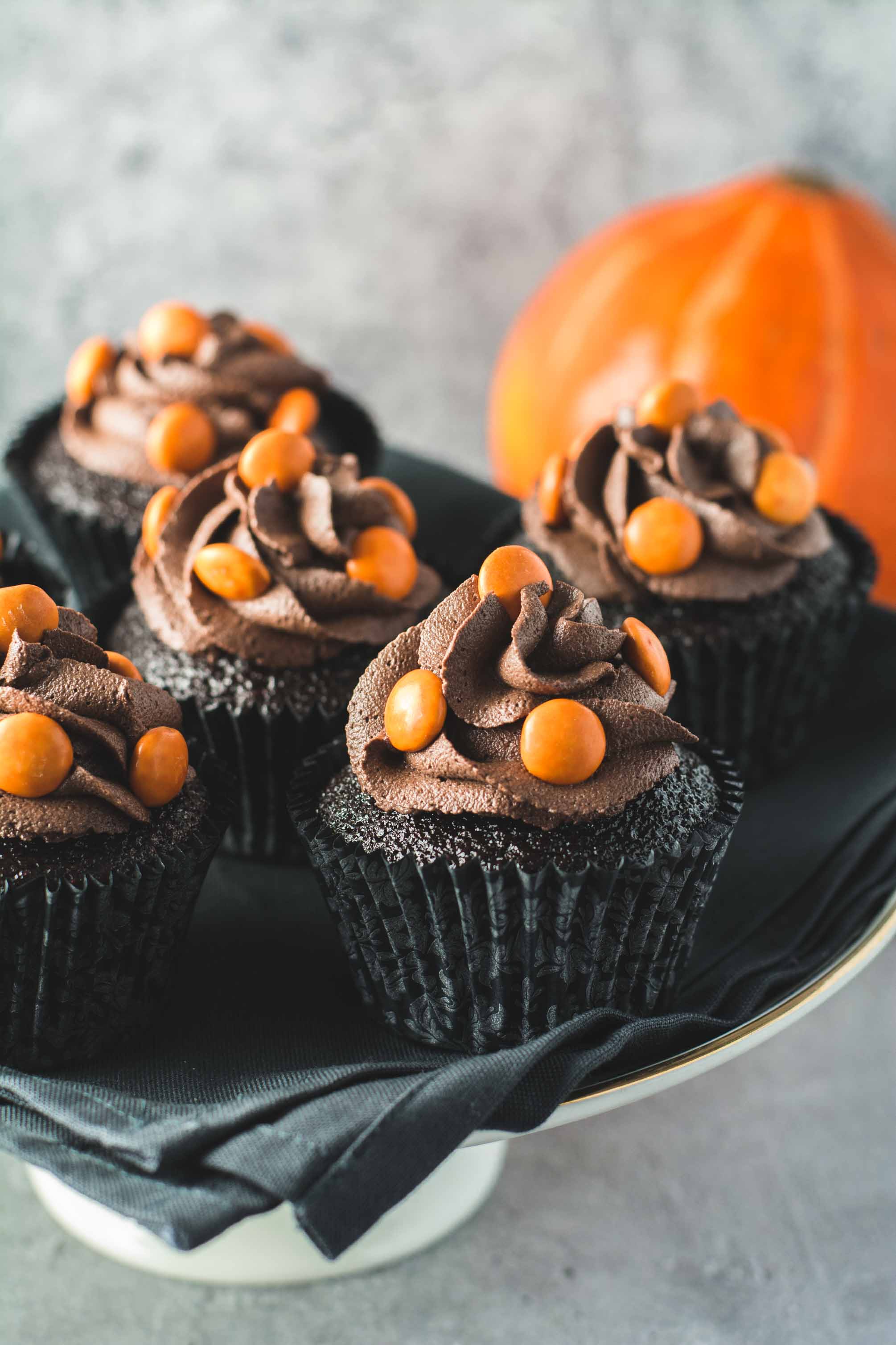 Batch of chocolate Halloween cupcakes on a tray