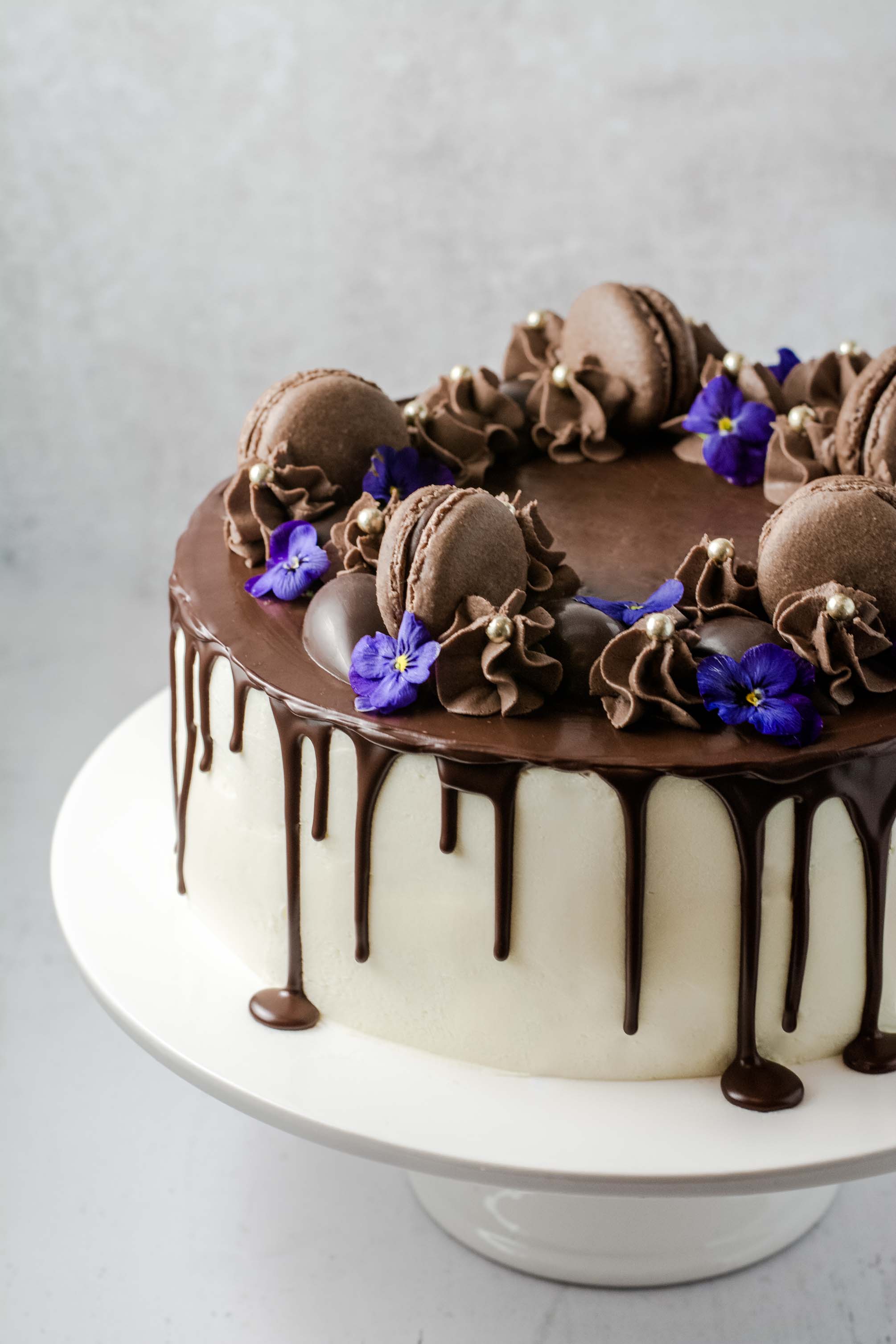 Chocolate layer cake filled with mango and passion fruit