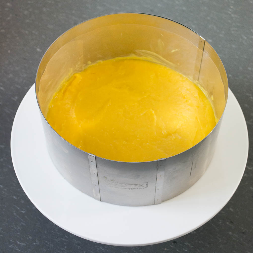 Bowl of mango curd for layer cake filling