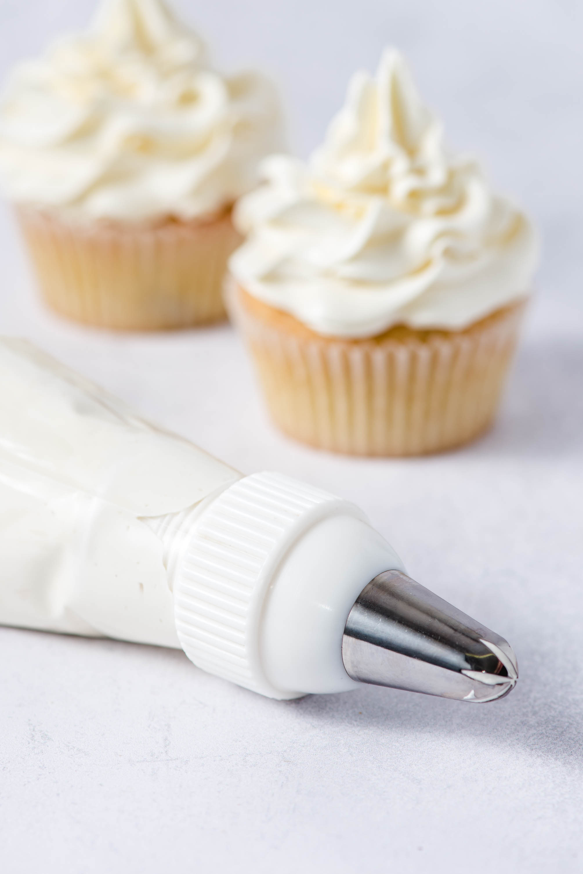 Bowl of fluffy meringue buttercream frosting