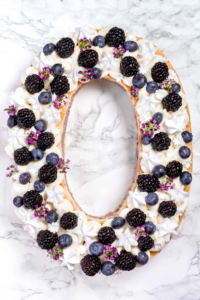 Lemon blackberry number cake topped with fresh blackberries