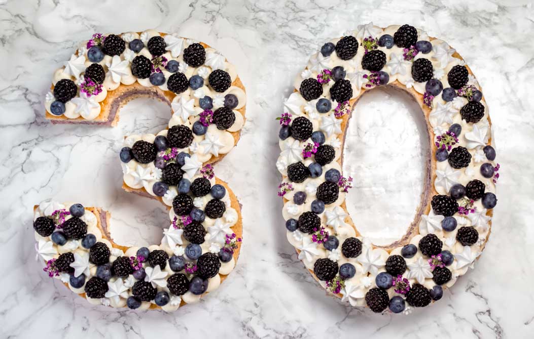Round sponge cake before being cut into a number shape