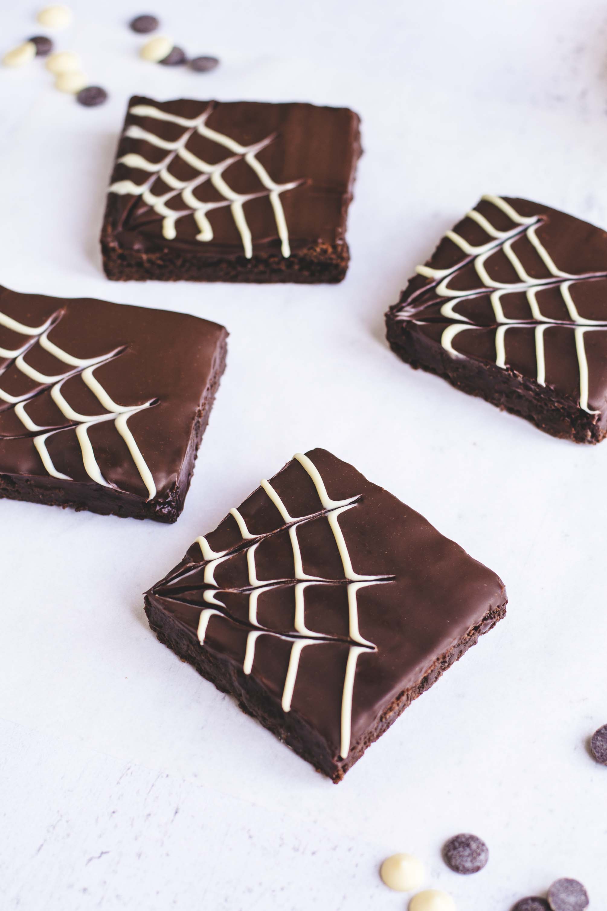 Spider web brownies cut into squares for Halloween