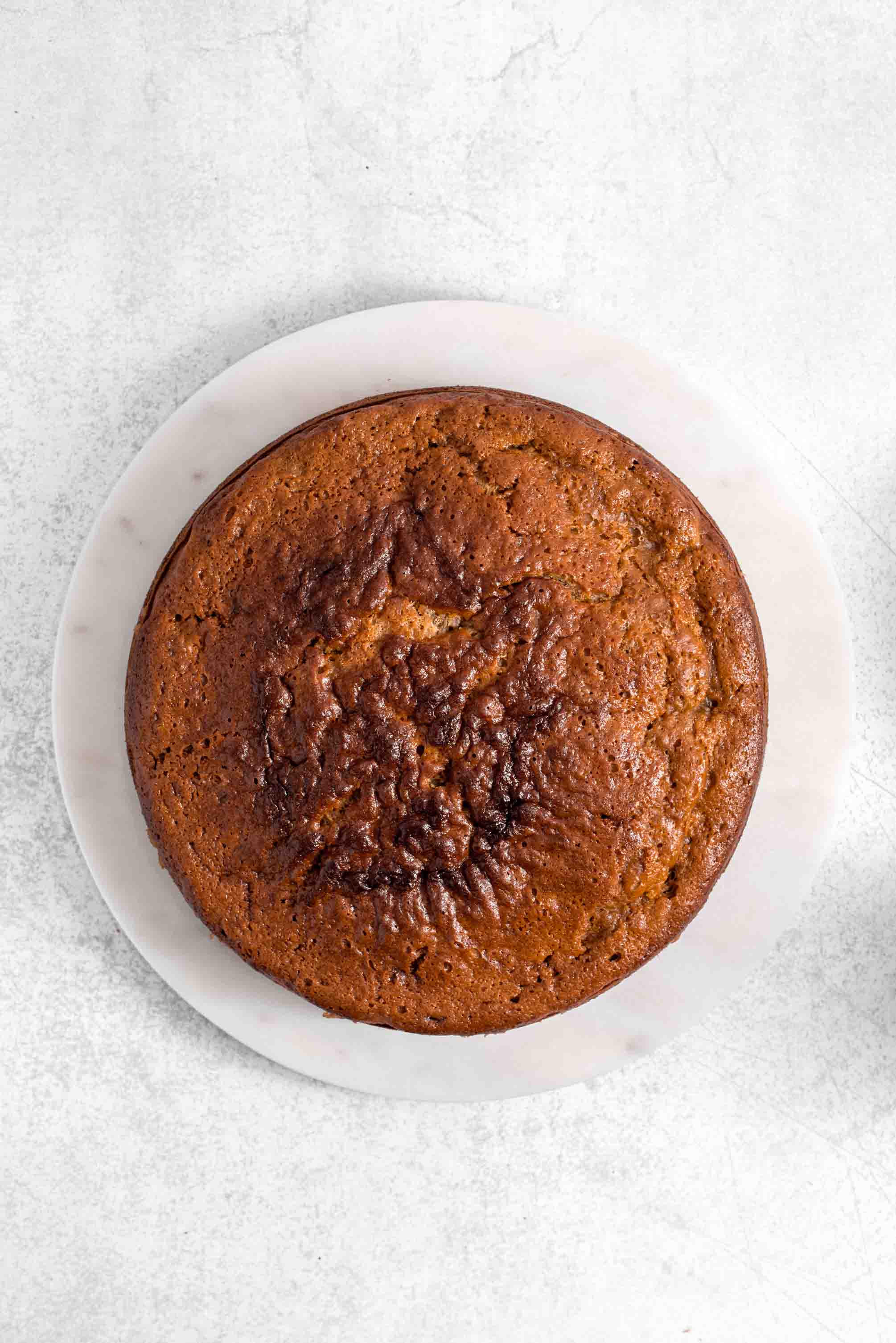 Slice of moist banana cake with Nutella frosting